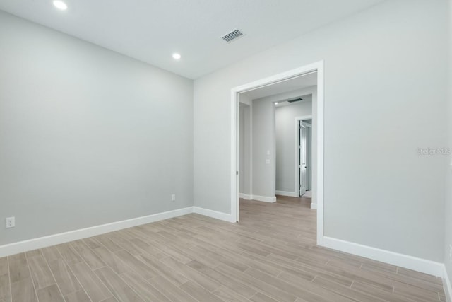 3563 Santa Caterina Blvd, Bradenton, FL 34211 - spare room featuring baseboards, light wood-style floors, visible vents, and recessed lighting