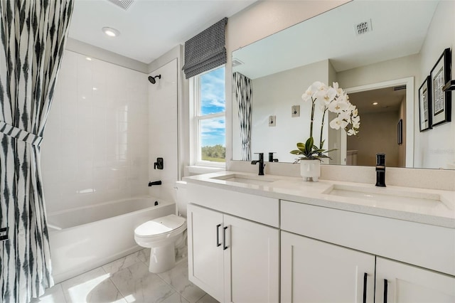 full bathroom featuring toilet, visible vents, marble finish floor, and a sink