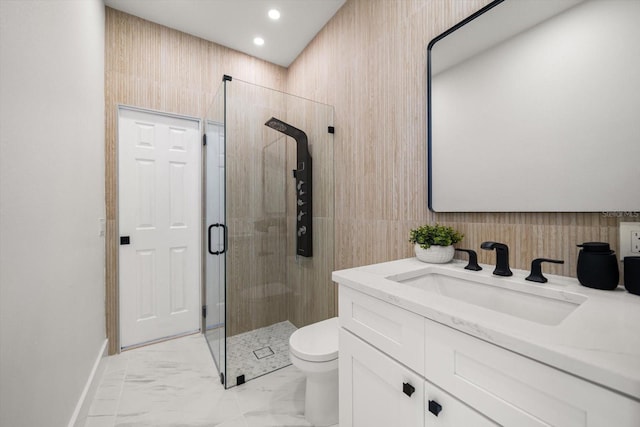 bathroom with vanity, recessed lighting, a stall shower, toilet, and marble finish floor