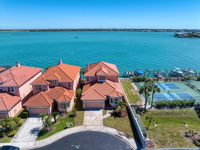 bird's eye view featuring a residential view and a water view