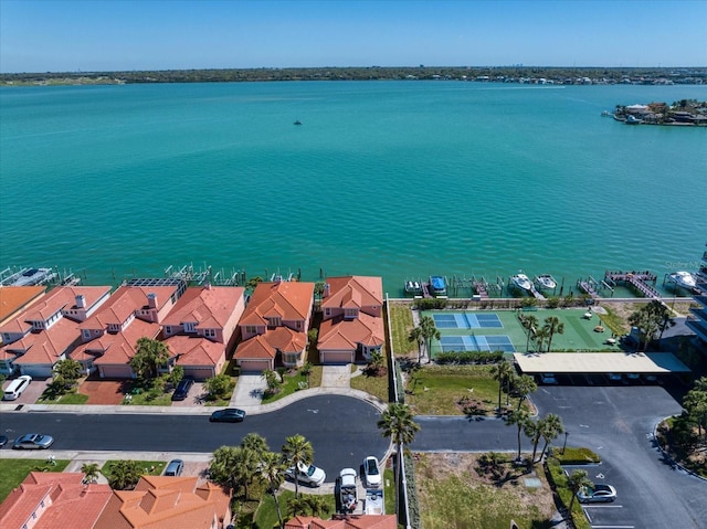 bird's eye view with a residential view and a water view