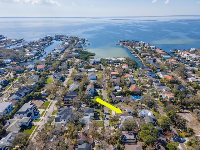 bird's eye view with a residential view and a water view