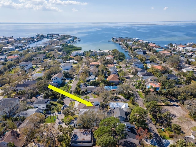 bird's eye view featuring a water view and a residential view