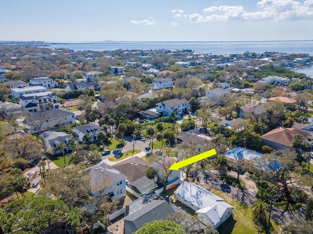 bird's eye view featuring a residential view and a water view