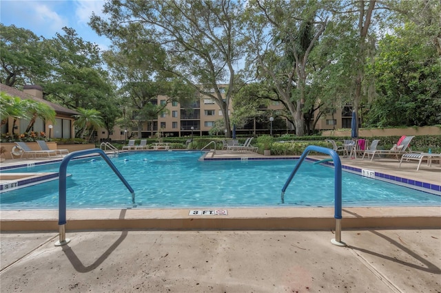 pool featuring a patio area