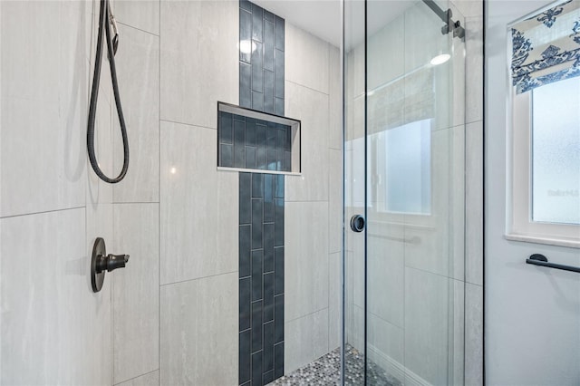 bathroom featuring a stall shower