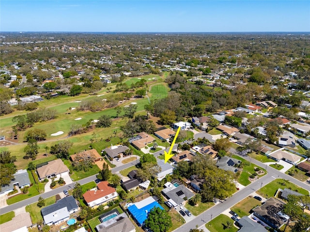 drone / aerial view with a residential view and view of golf course