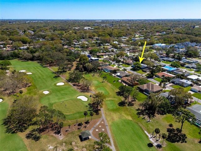 bird's eye view with view of golf course