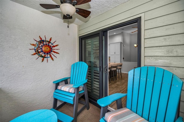 view of patio / terrace featuring a ceiling fan