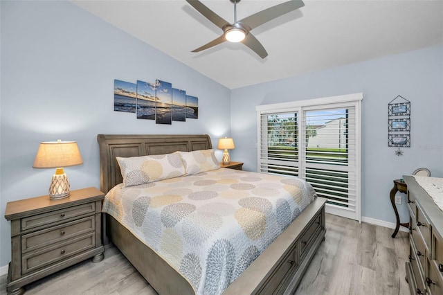 bedroom featuring baseboards, lofted ceiling, light wood-style flooring, ceiling fan, and access to exterior