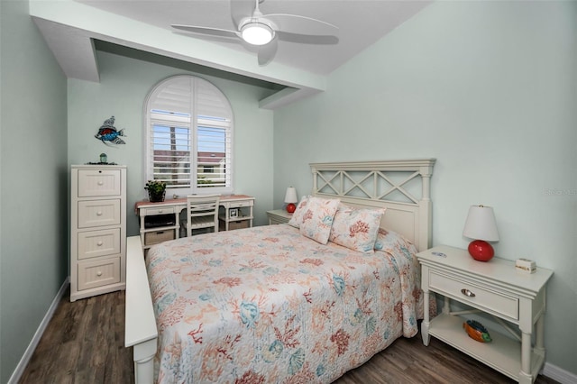 bedroom featuring ceiling fan, dark wood-type flooring, and baseboards