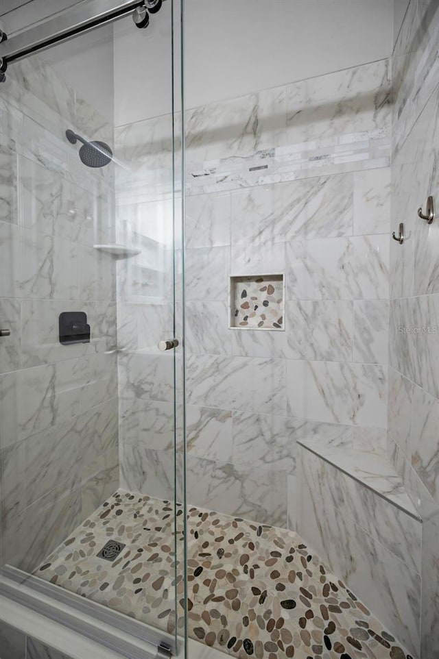 full bathroom featuring a stall shower