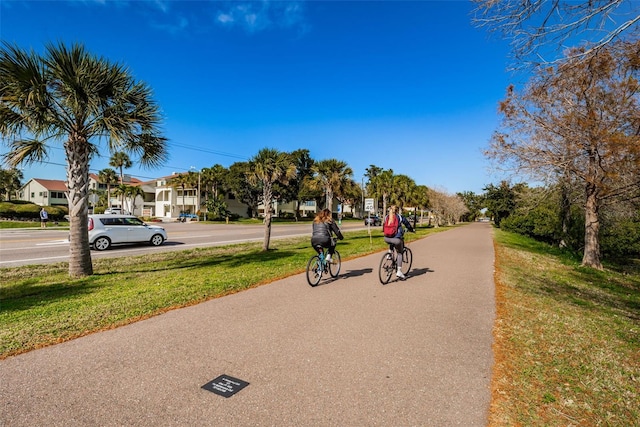 view of community with a yard and a residential view