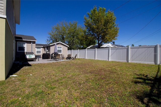 view of yard featuring a patio area and fence