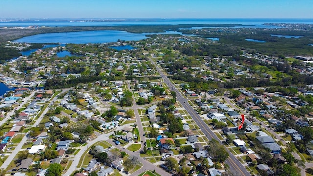 aerial view featuring a residential view and a water view