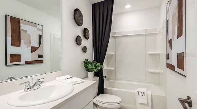 full bathroom featuring vanity, toilet, and shower / washtub combination