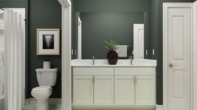 bathroom featuring double vanity, curtained shower, toilet, and a sink