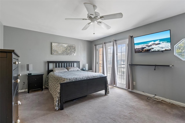 bedroom with baseboards, ceiling fan, carpet flooring, and access to outside