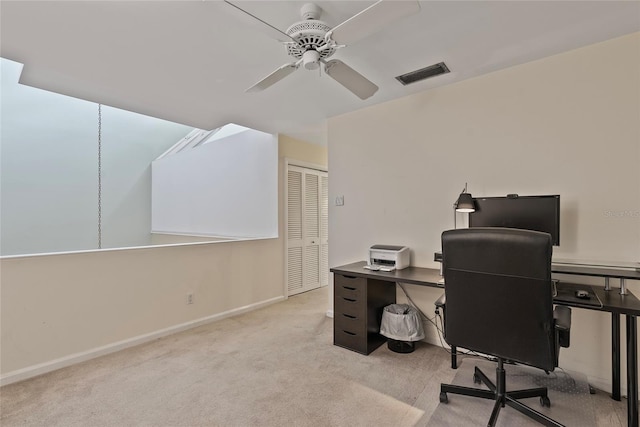 office with visible vents, baseboards, ceiling fan, and carpet floors