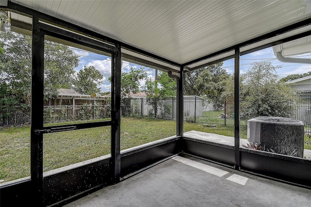 unfurnished sunroom featuring a wealth of natural light