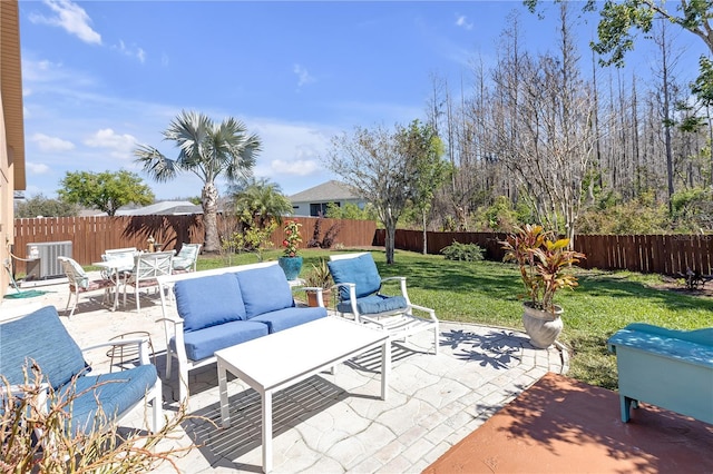 view of patio / terrace with outdoor lounge area, outdoor dining area, central AC unit, and a fenced backyard