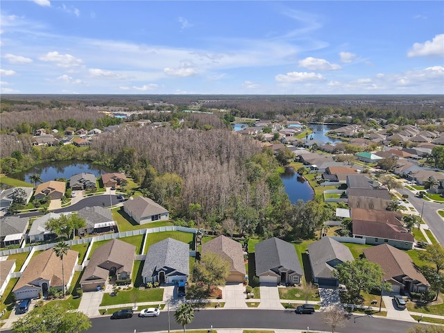 aerial view featuring a residential view and a water view