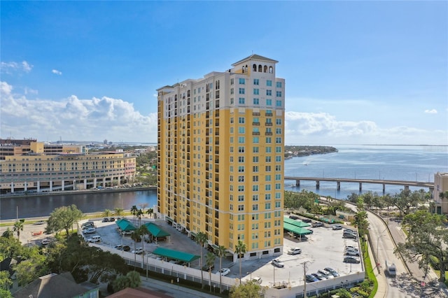 view of building exterior featuring a water view