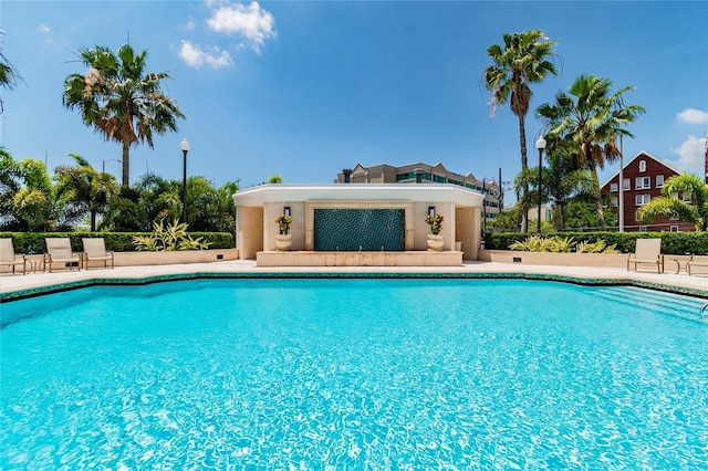 community pool featuring a patio