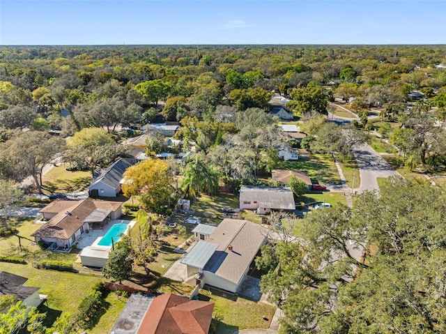 aerial view featuring a view of trees