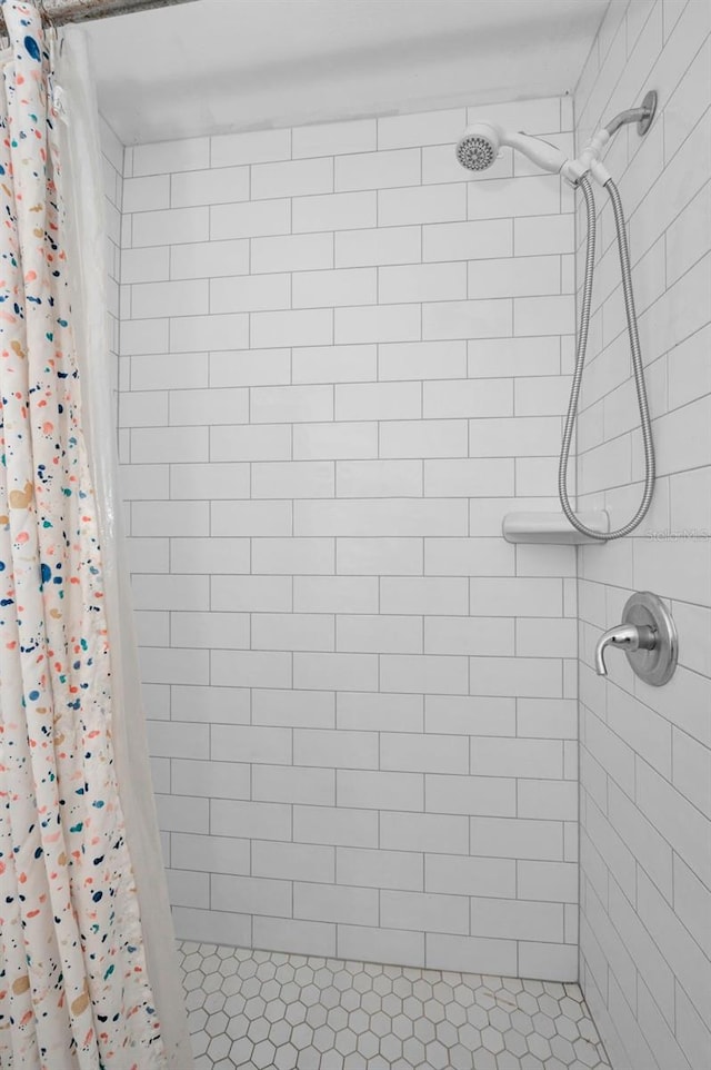 bathroom featuring a stall shower