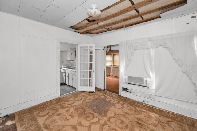 empty room featuring a sink and cooling unit