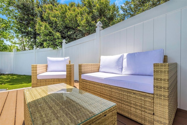 view of patio / terrace featuring an outdoor hangout area and a fenced backyard