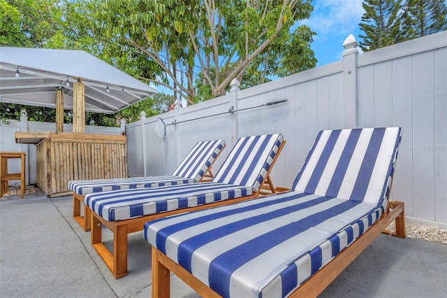 view of patio with fence