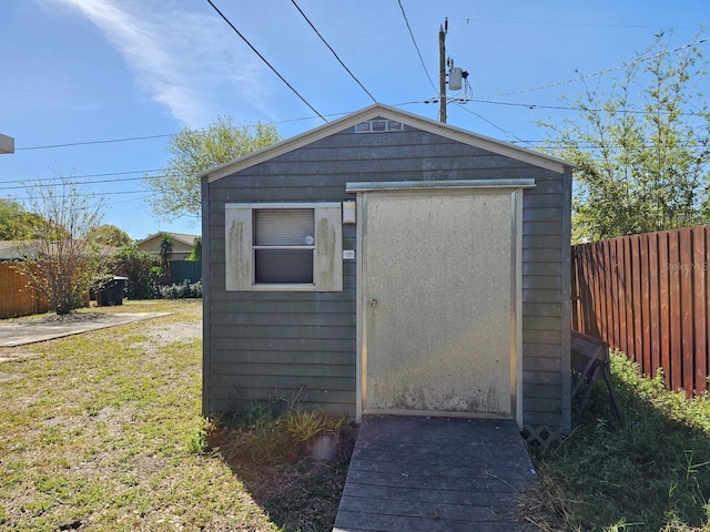 view of shed featuring a fenced backyard