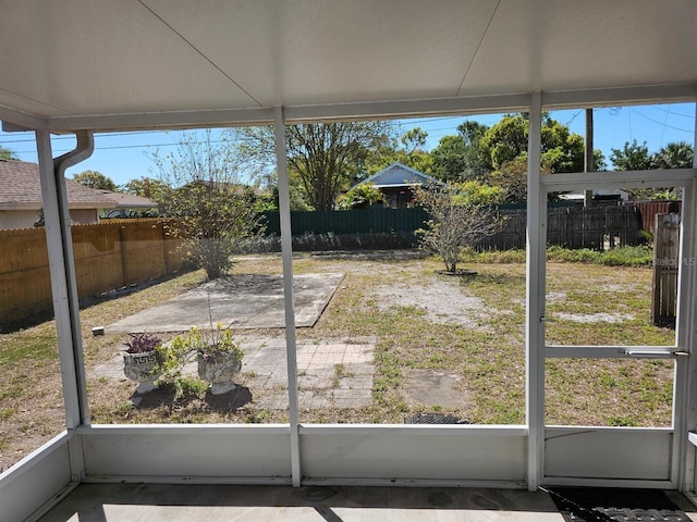 unfurnished sunroom featuring a healthy amount of sunlight