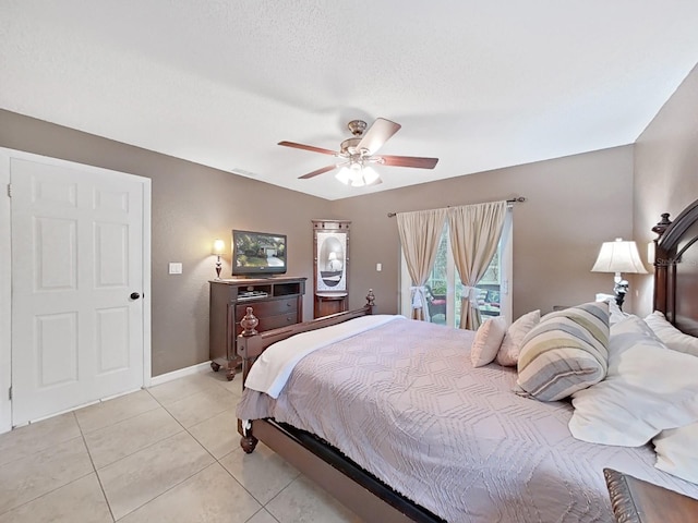 bedroom featuring light tile patterned floors, baseboards, visible vents, ceiling fan, and access to exterior