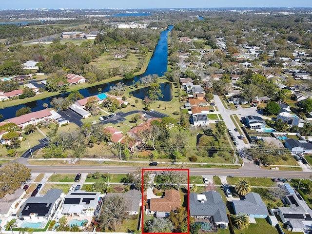 bird's eye view with a water view and a residential view