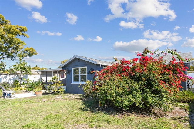 exterior space with a yard