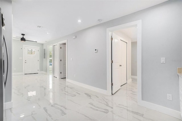 unfurnished room featuring recessed lighting, baseboards, marble finish floor, and a ceiling fan