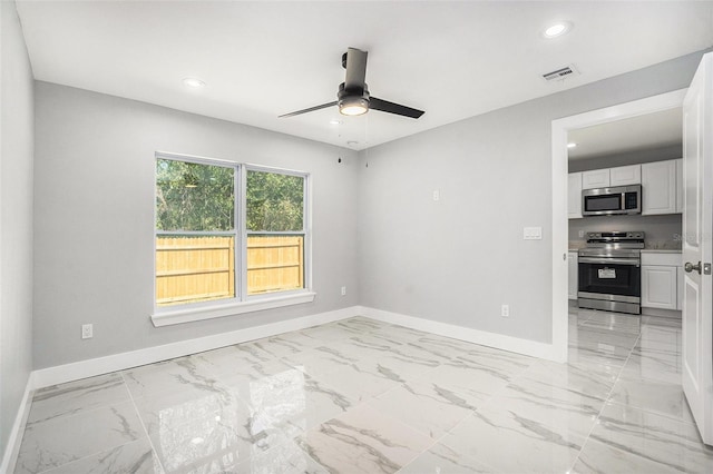 unfurnished living room with visible vents, marble finish floor, a ceiling fan, recessed lighting, and baseboards