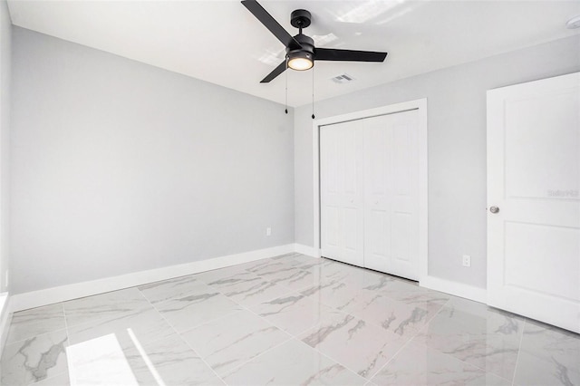 unfurnished bedroom with visible vents, marble finish floor, and baseboards