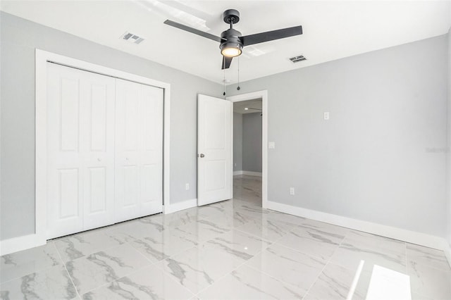 unfurnished bedroom featuring visible vents, marble finish floor, and baseboards