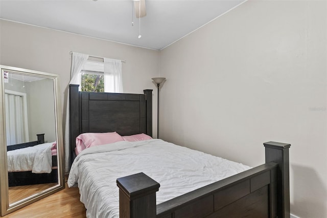 bedroom featuring ceiling fan and light wood-style floors