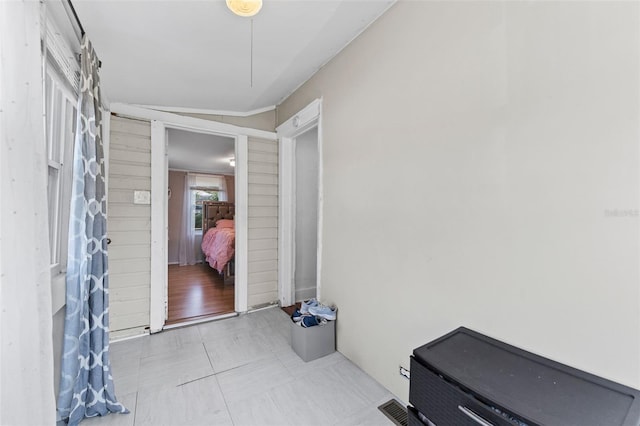 foyer entrance with visible vents