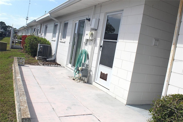 view of patio with central AC