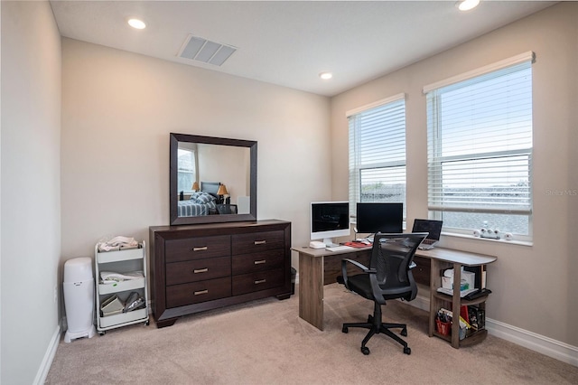 home office featuring recessed lighting, baseboards, visible vents, and light carpet