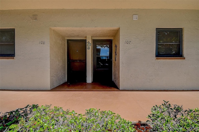 5920 80th St N Unit 107, Saint Petersburg, FL 33709 - property entrance with stucco siding
