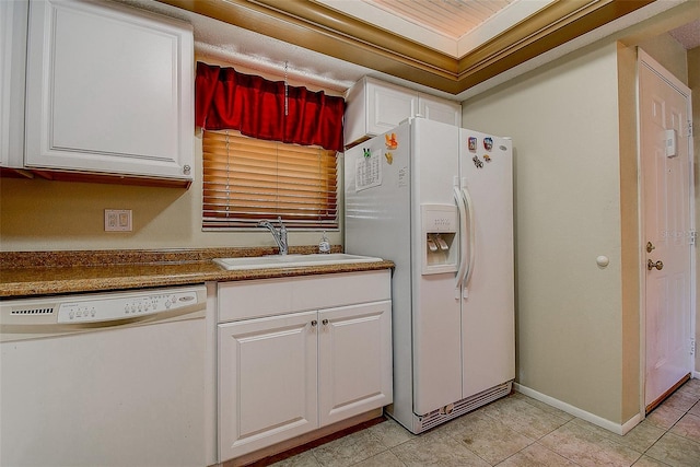 5920 80th St N Unit 107, Saint Petersburg, FL 33709 - kitchen featuring light tile patterned flooring, white cabinetry, a sink, and white appliances