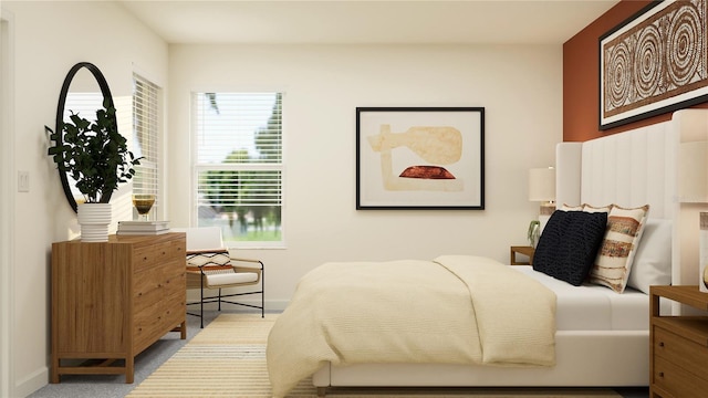 bedroom featuring baseboards and carpet floors