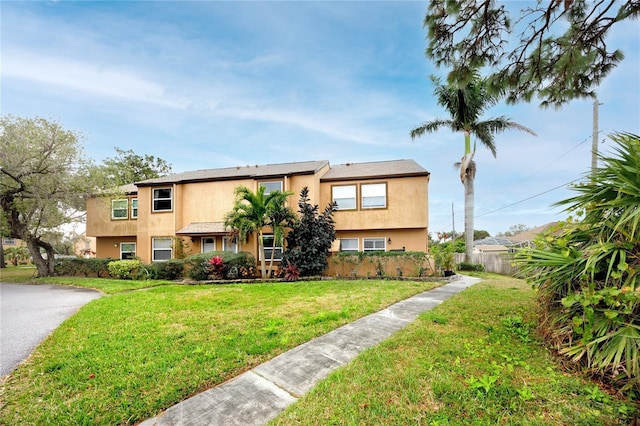 view of property with fence